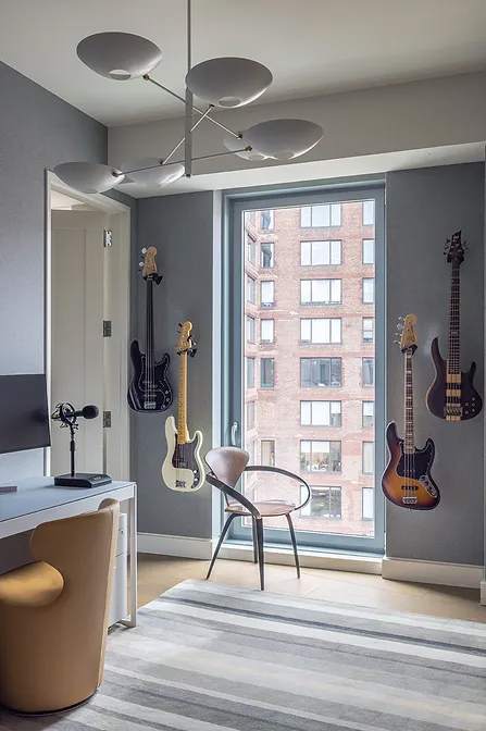 a unique guitar collection in the home office






